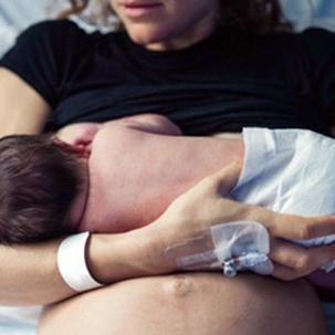 A new mother nursing her baby